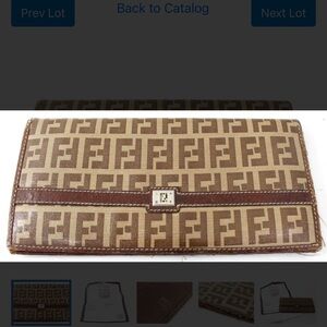 Authentic Fendi Beige and Brown FF Monogram Continental Wallet with COA.